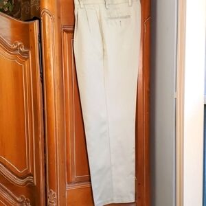 DOCKERS KHAKI SLACKS, Size 34 X 30, pleated front. Side pockets 2 button pockets